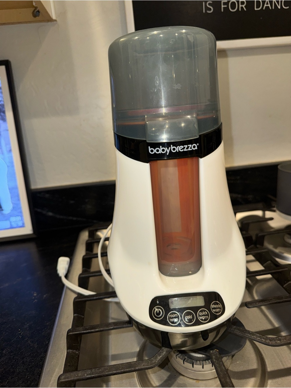 Baby Brezza Formula Pro Dispenser in White with Gray and Orange Accents